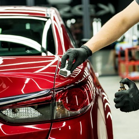 car-service-worker-applying-nano-coating-car-detail (1)